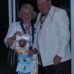 PDG George of Leigh-on-Sea President Angela with a pennant
