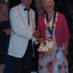 JoAnn receiving her pin and certificate (now SWANS)