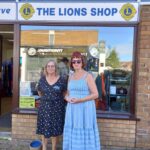 Sandie is pictured here with Lydia who was volunteering in the shop