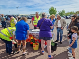 Jackie, Ralph, Richard and Robyn selling tulips
