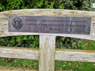 plaque on the bench at Thiepval Memorial donated by District 105E to those that lost their life in WW1