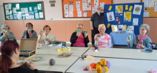 Knit and Natter group with their Message in a Bottles or Message in a Wallet