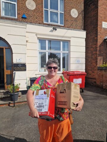 Robyn and Rick delivering spectacles to MDHQ on the way to Convention