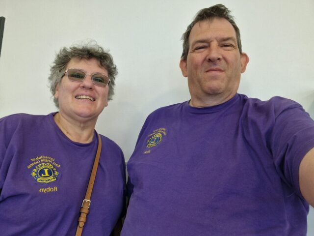 Robyn and Rick in club t-shirts
