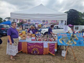 Robyn, Moira and Sandie all ready at the stall