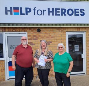 Moira and Mark delivered a cheque to the HQ of Help For Heroes