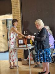 President Louisa and Angela drawing the raffle