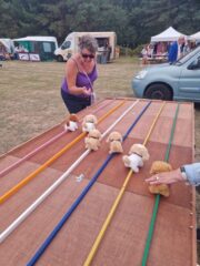Robyn trying to encourage her dogs to win! Run by Chelmsford Lions Robyn trying to encourage her dogs to win! Run by Chelmsford Lions