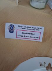 President Louisa's table name card