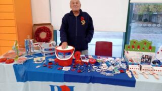 Tony at the Poppy Stall Tony at the Poppy Stall