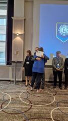 Robyn receiving her ALLI certificate