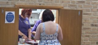 Drinks and cake served from the kitchen