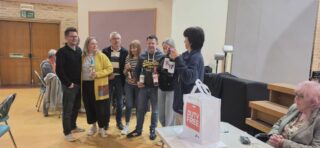 President Louisa with the winning team and their prizes