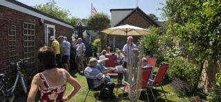Guests enjoying the sunchine in the garden at the Club Lunch