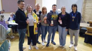 President Louisa with the winning team and their prizes
